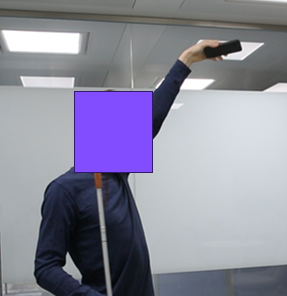 A user aiming the phone at a chair because they believe the object is on the chair.